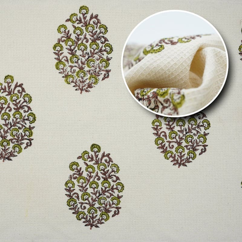 Elegant green towel folded on shelf