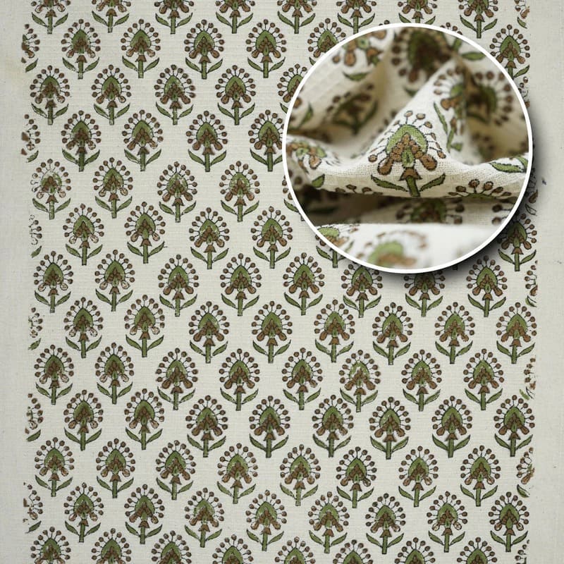 Green patterned towel stacked on rack