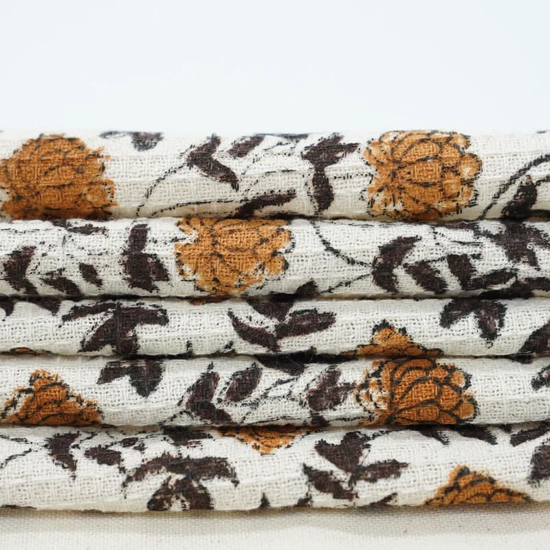 Green hand towel on kitchen countertop