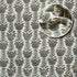 Green hand towel rolled for elegant display
