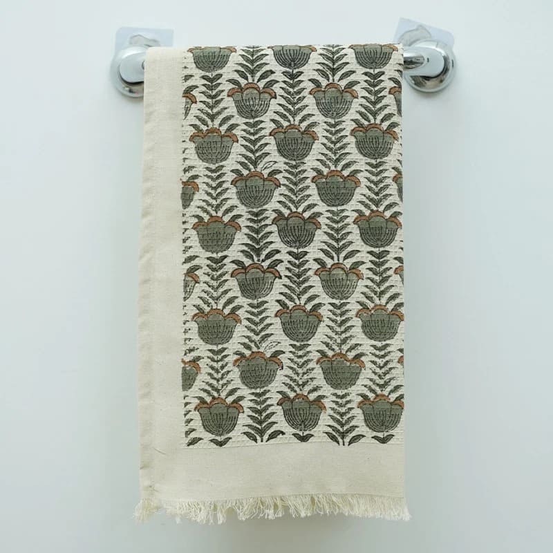 Cotton towel green patterned on vanity