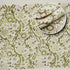 Decorative green hand towel on bathroom tray