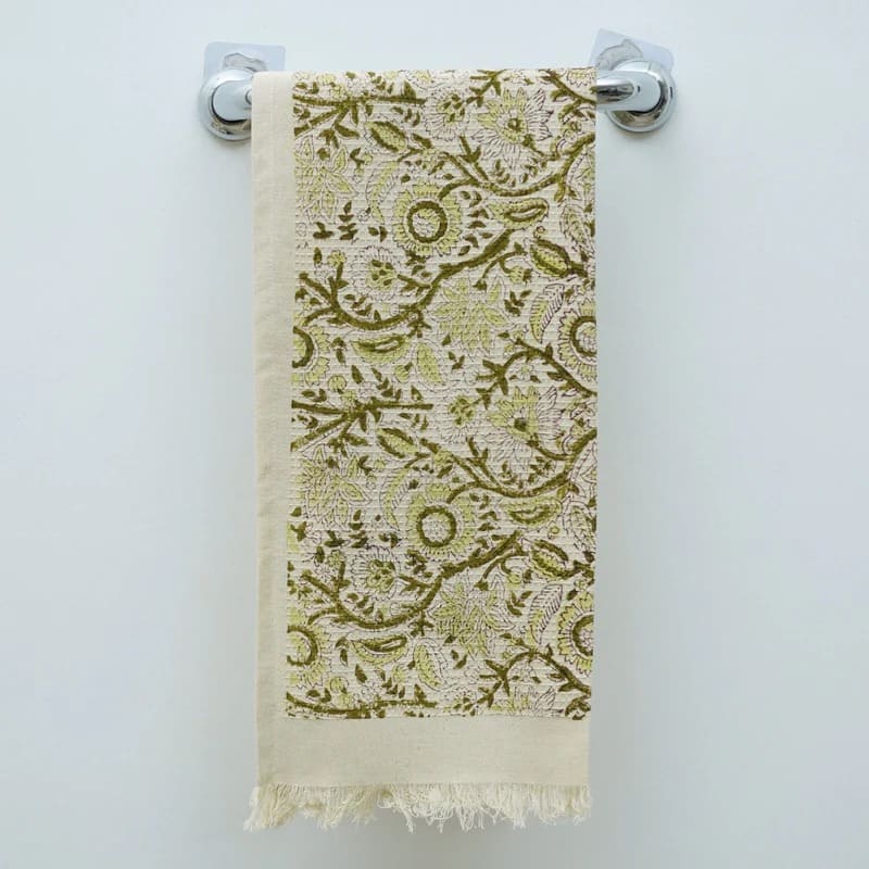 Green towel with textured cotton pattern