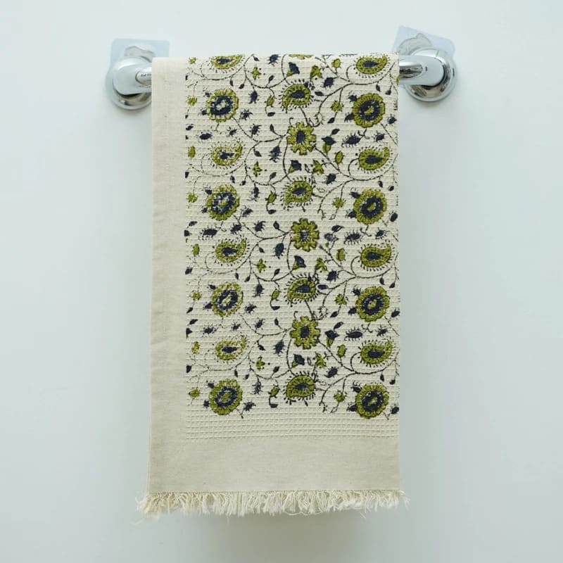 Printed tea towel in green with modern artwork