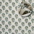 Green patterned hand towel with stylish accents