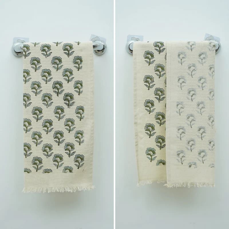 Printed green towel with minimalist decorative design