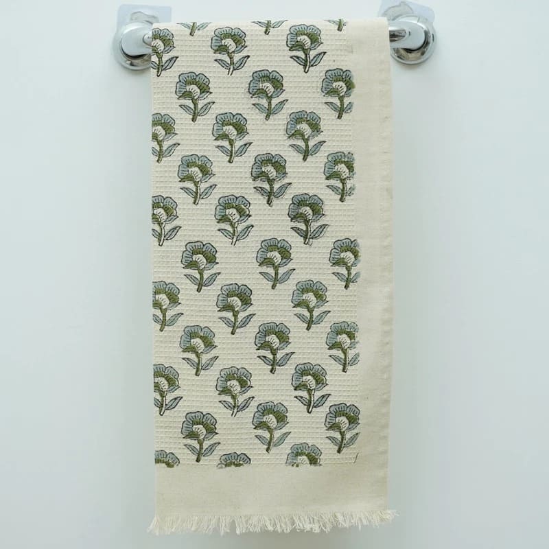 Waffle weave green towel with absorbent cotton feel