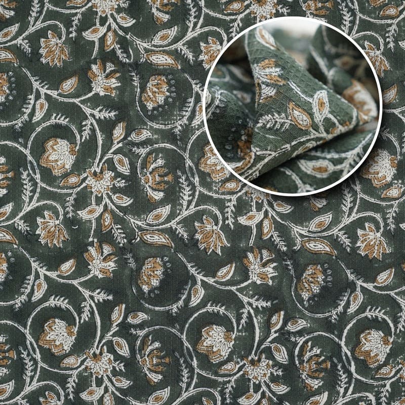 Cotton towel in green with printed artistic design