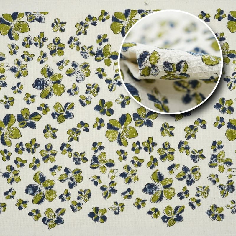 Printed tea towel in green with geometric accents