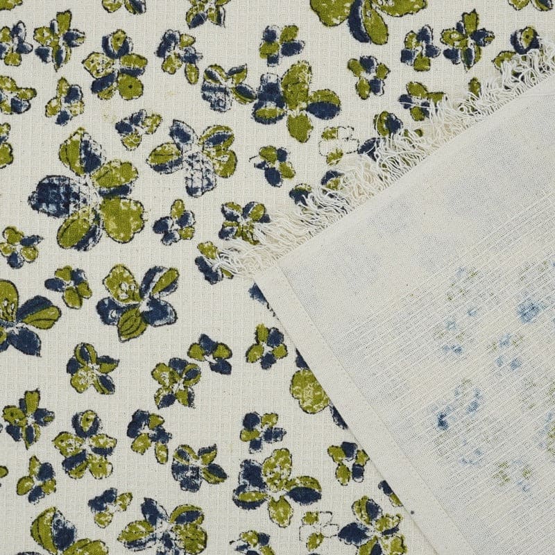 Green patterned towel with subtle printed details