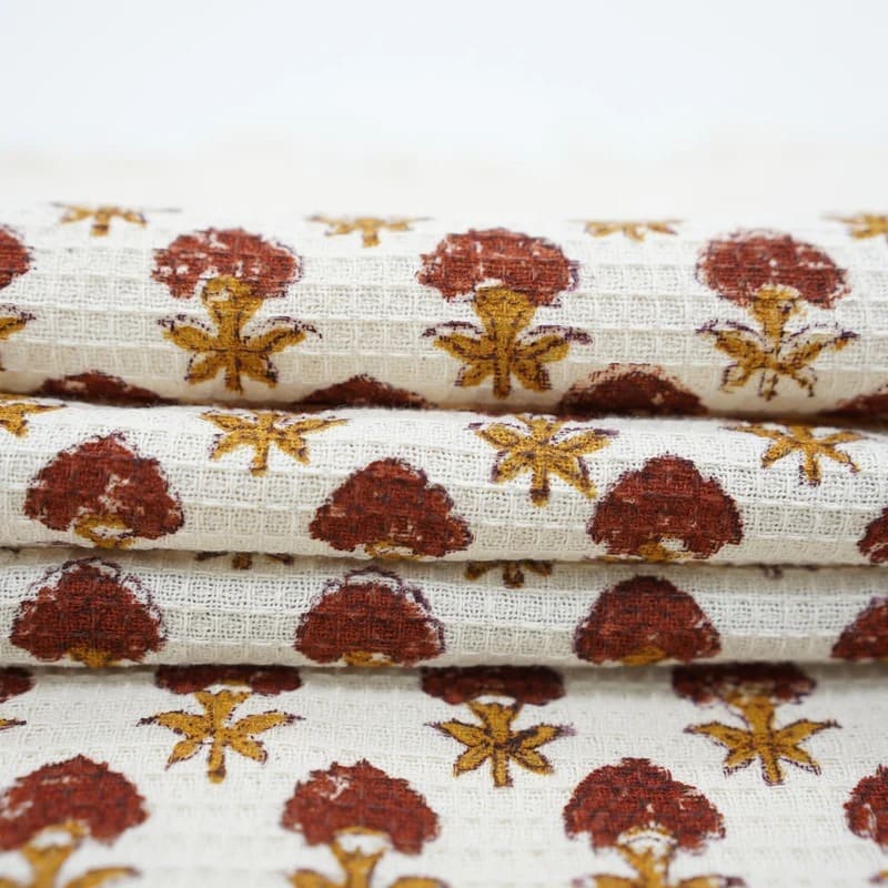 Printed green towel with unique design accents