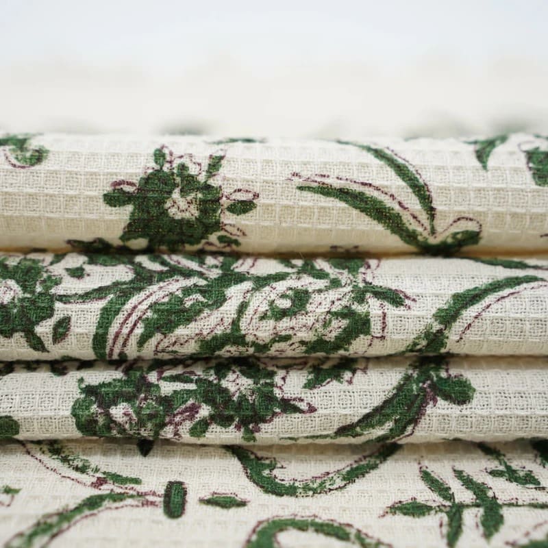 Waffle weave towel in muted green tone