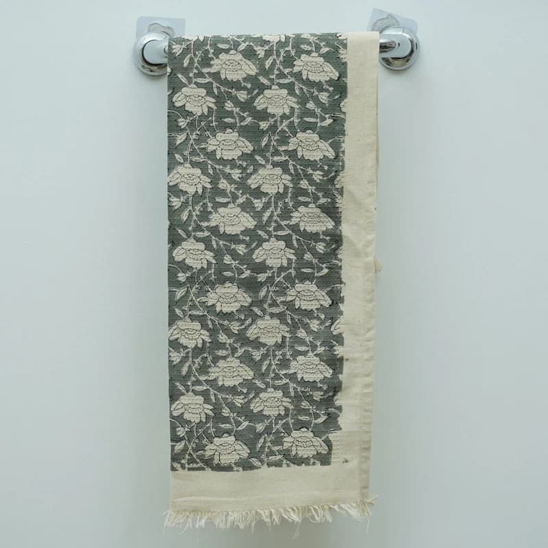 Hand towel with green decorative design