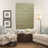 Drapes and roman shades for layered window look