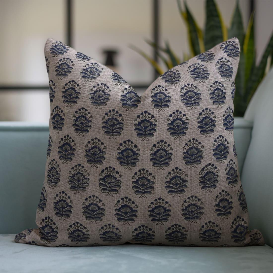 Blue throw pillow floral pattern 

