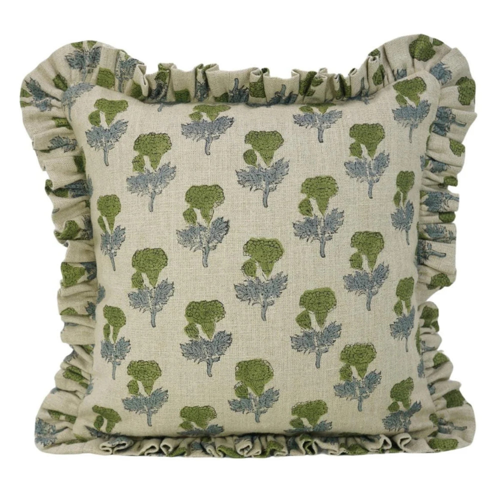 Charming frill linen pillow covers with green leaf patterns and ruffled edges on a crisp white background.