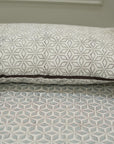 Hand block printed cotton bedsheet with floral design and matching pillow covers

