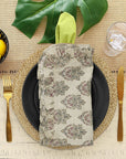 Floral block print frill napkin on a beautifully set table.