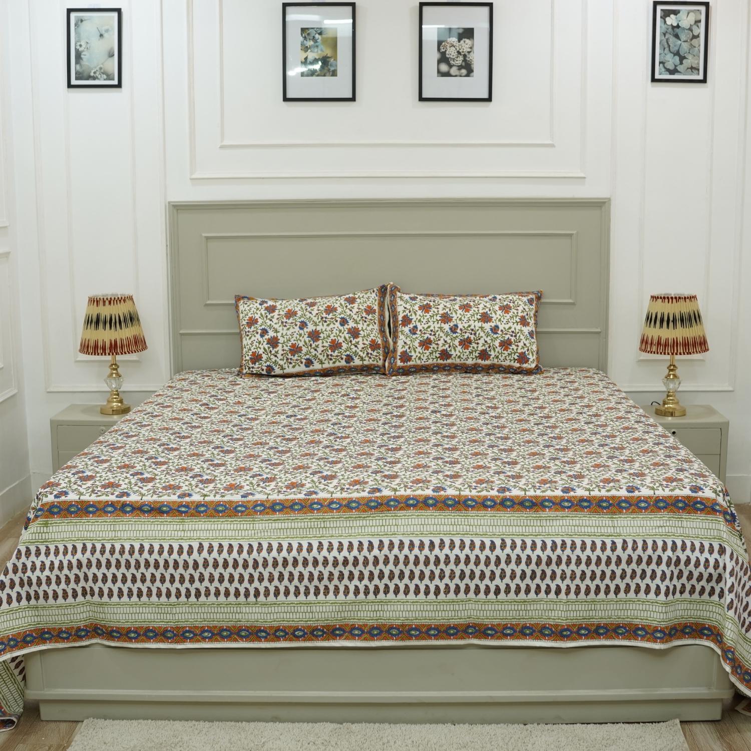 This hand block printed cotton bedsheet and pillow set is a statement in sustainable living. Natural dyes and floral designs create a calming aesthetic, offering handmade luxury with a touch of earthy elegance.
