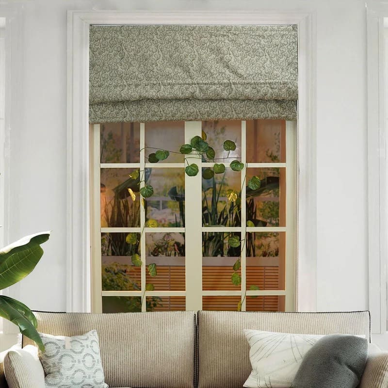 Roman shade window covering adding charm to living room decor