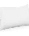Plush white pillow insert on a clean, soft surface.