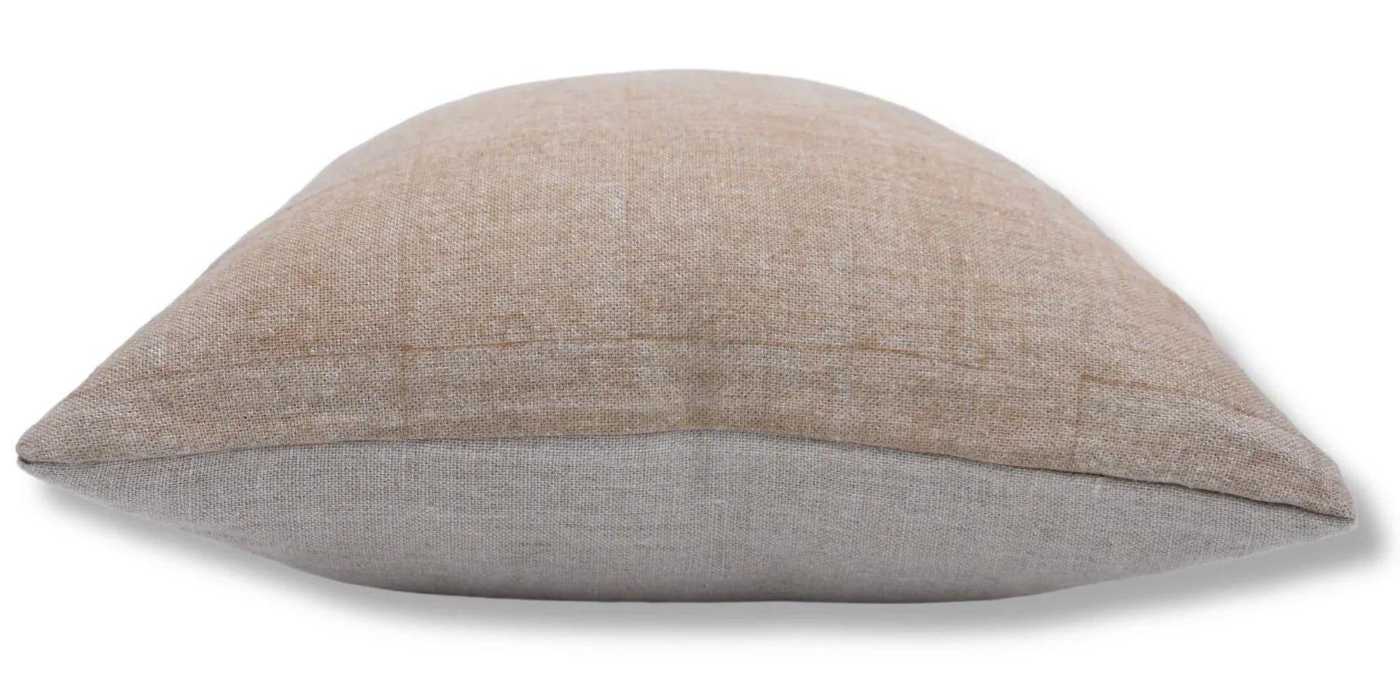 Textured pillow with two-tone design on a white background